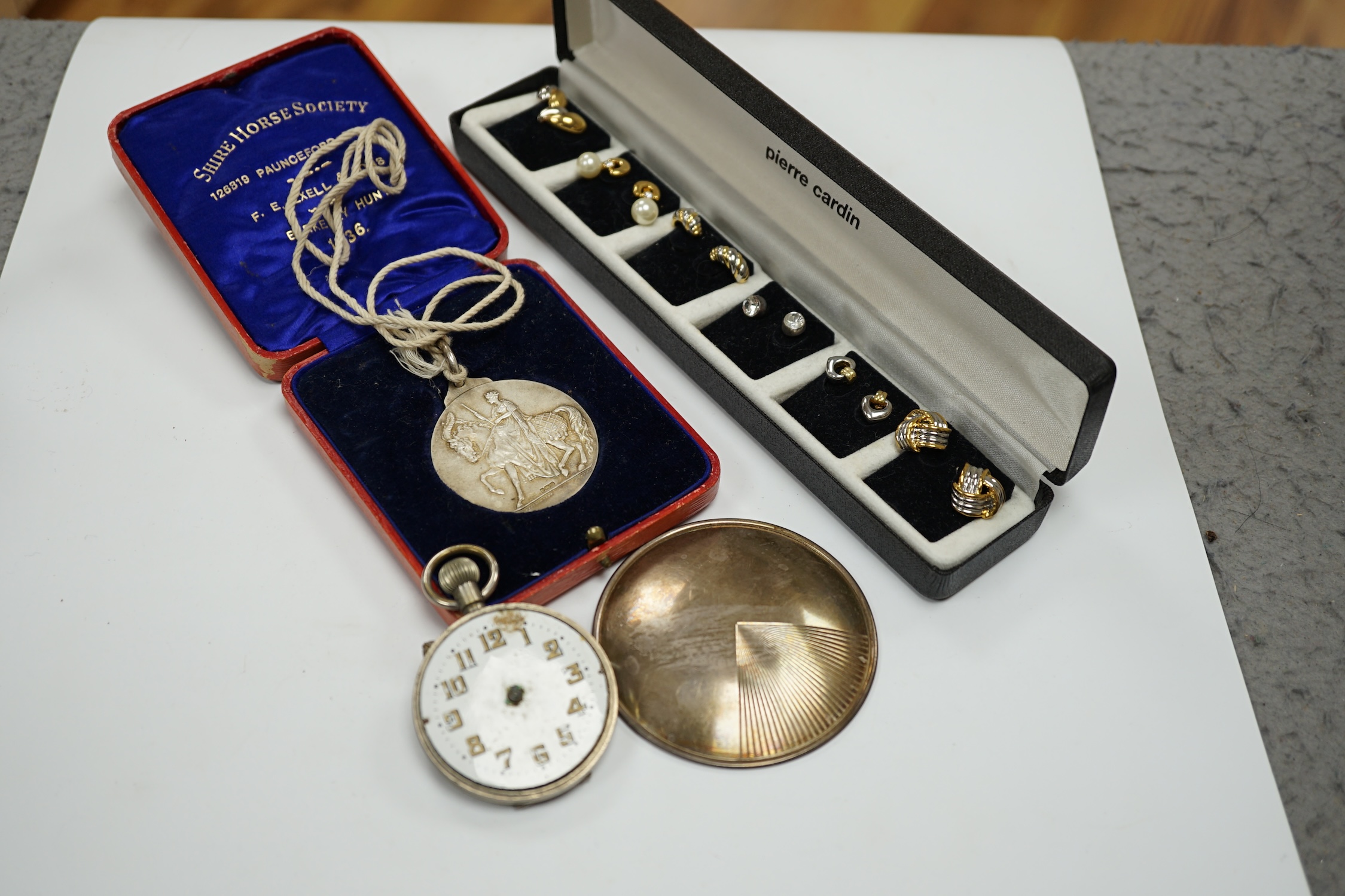 A late Victorian silver oval locket on a white metal chain and other jewellery etc., including three rings, a pocket watch and two modern silver brooches by Clive Edward Burr, largest 75mm. Condition - varies, poor to fa